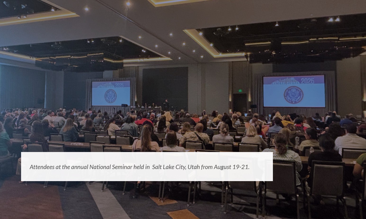 photo of seminar attendees in a session at the 2025 National Seminar held in August 2025.