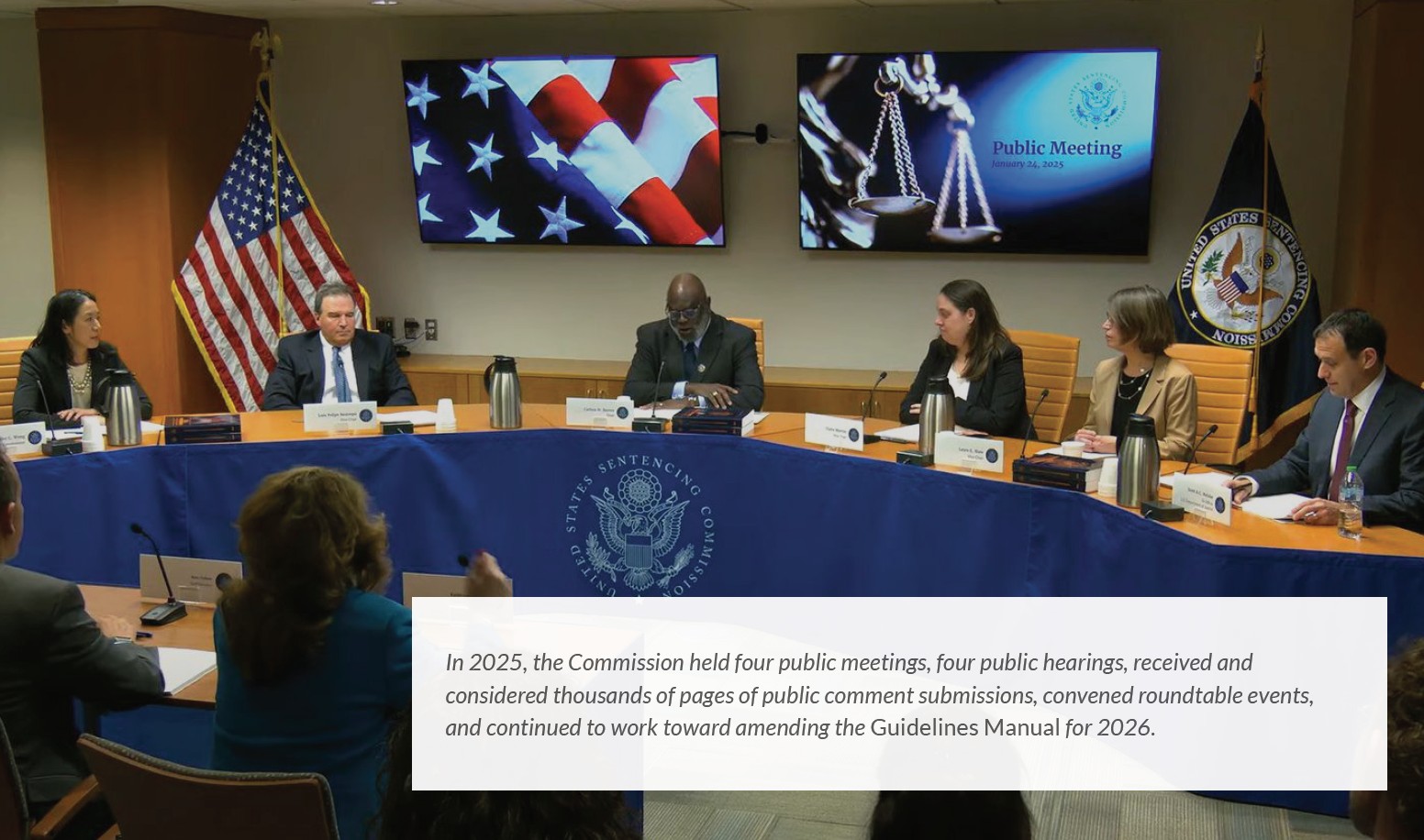 photo of commissioners holding their January 2025 public meeting.